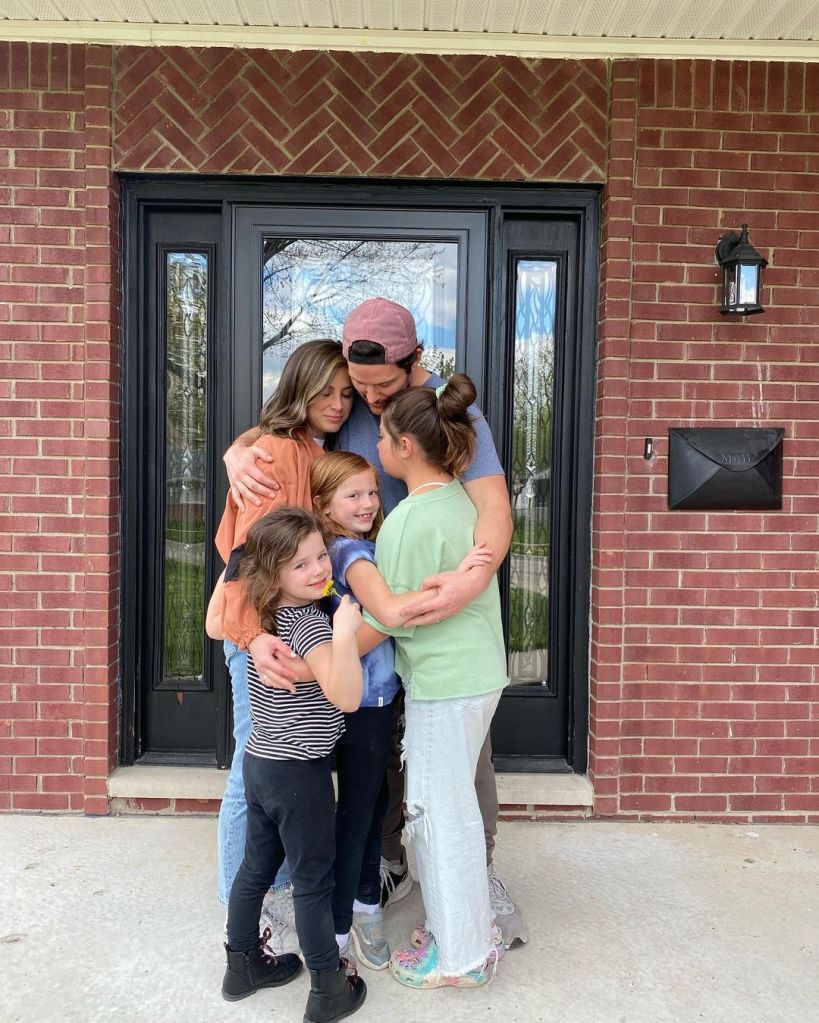 Drew Cheetwood family hug